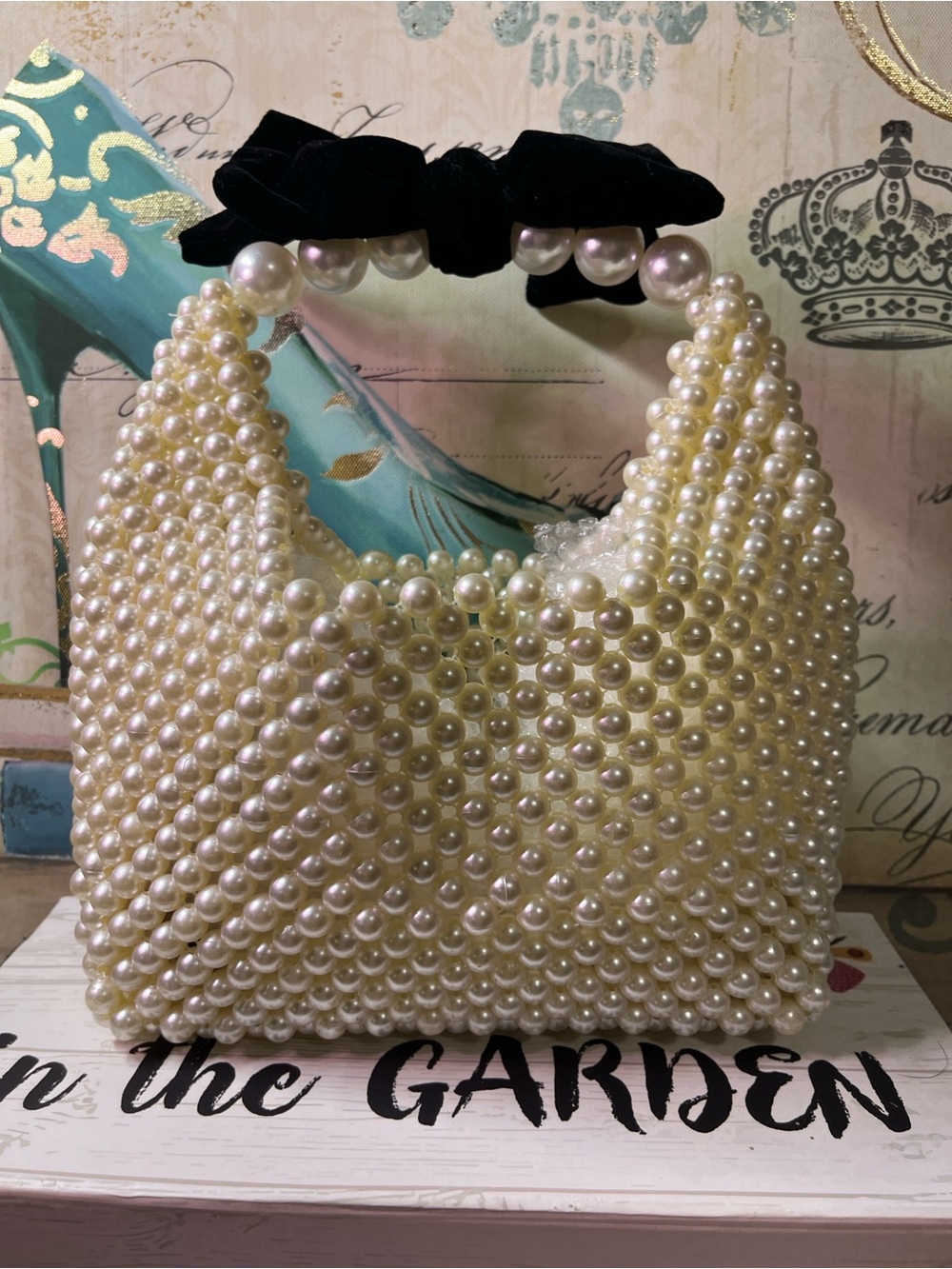 Pearl-Embellished Handbag with Black Velvet Bow